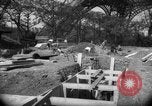 Image of civil defense trench digging at Eiffel Tower Paris France, 1939, second 36 stock footage video 65675053614