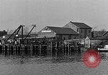 Image of Curtis Boat & Engine Corp on riverfront Norfolk Virginia United States USA, 1932, second 39 stock footage video 65675053626