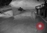 Image of indoor ski slope New York City USA, 1936, second 29 stock footage video 65675053650