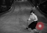 Image of indoor ski slope New York City USA, 1936, second 44 stock footage video 65675053650