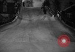 Image of indoor ski slope New York City USA, 1936, second 47 stock footage video 65675053650