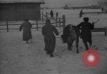 Image of Ukraine farm workers on snow covered farm Kiev Ukraine, 1947, second 15 stock footage video 65675053671