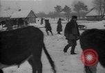 Image of Ukraine farm workers on snow covered farm Kiev Ukraine, 1947, second 21 stock footage video 65675053671