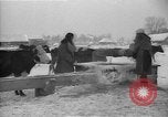 Image of Ukraine farm workers on snow covered farm Kiev Ukraine, 1947, second 31 stock footage video 65675053671