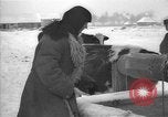 Image of Ukraine farm workers on snow covered farm Kiev Ukraine, 1947, second 32 stock footage video 65675053671