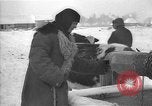 Image of Ukraine farm workers on snow covered farm Kiev Ukraine, 1947, second 33 stock footage video 65675053671