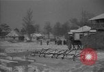 Image of Ukraine farm workers on snow covered farm Kiev Ukraine, 1947, second 37 stock footage video 65675053671