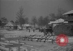 Image of Ukraine farm workers on snow covered farm Kiev Ukraine, 1947, second 38 stock footage video 65675053671