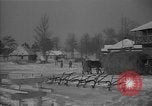 Image of Ukraine farm workers on snow covered farm Kiev Ukraine, 1947, second 39 stock footage video 65675053671