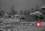 Image of Ukraine farm workers on snow covered farm Kiev Ukraine, 1947, second 41 stock footage video 65675053671