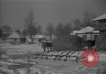 Image of Ukraine farm workers on snow covered farm Kiev Ukraine, 1947, second 42 stock footage video 65675053671