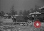 Image of Ukraine farm workers on snow covered farm Kiev Ukraine, 1947, second 44 stock footage video 65675053671