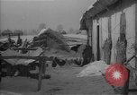 Image of Ukraine farm workers on snow covered farm Kiev Ukraine, 1947, second 52 stock footage video 65675053671