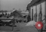 Image of Ukraine farm workers on snow covered farm Kiev Ukraine, 1947, second 53 stock footage video 65675053671