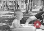 Immagine di La balneazione un neonato Greenbelt Maryland USA, 1939, secondo 1 filmato di repertorio 65675053713