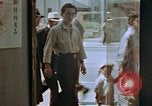 Standbild ration line Kyoto Japan, 1946, aus Sekunde 17 historischem Filmmaterial Videoclip 65675053720