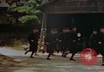 Standbild student Feuerwehrleute Kyoto Japan, 1946, aus Sekunde 11 historischem Filmmaterial Videoclip 65675053721