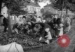 Image of Women pick up abandoned flowers London England United Kingdom, 1938, second 6 stock footage video 65675053799