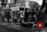 Image of Women pick up abandoned flowers London England United Kingdom, 1938, second 17 stock footage video 65675053799