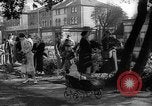Image of Women pick up abandoned flowers London England United Kingdom, 1938, second 19 stock footage video 65675053799