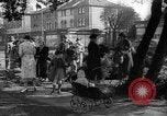 Image of Women pick up abandoned flowers London England United Kingdom, 1938, second 20 stock footage video 65675053799