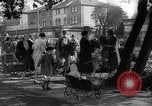 Image of Women pick up abandoned flowers London England United Kingdom, 1938, second 21 stock footage video 65675053799