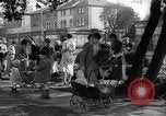 Image of Women pick up abandoned flowers London England United Kingdom, 1938, second 24 stock footage video 65675053799