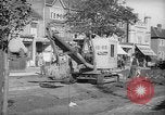 Image of steam shovel and heavy timbers at construction site London England United Kingdom, 1938, second 14 stock footage video 65675053800