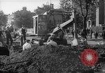 Image of steam shovel and heavy timbers at construction site London England United Kingdom, 1938, second 26 stock footage video 65675053800