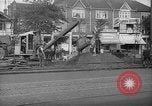 Image of steam shovel and heavy timbers at construction site London England United Kingdom, 1938, second 59 stock footage video 65675053800
