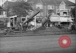 Image of steam shovel and heavy timbers at construction site London England United Kingdom, 1938, second 60 stock footage video 65675053800