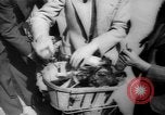 Image of basket of cycle United Kingdom, 1944, second 32 stock footage video 65675053876