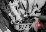 Image of basket of cycle United Kingdom, 1944, second 34 stock footage video 65675053876
