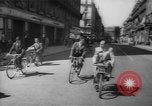 Image of basket of cycle United Kingdom, 1944, second 54 stock footage video 65675053876