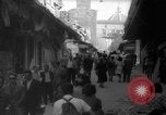 Image of Italian people crossing the war damaged Ponte Vecchio Bridge in Floren Florence Italy, 1945, second 15 stock footage video 65675053879