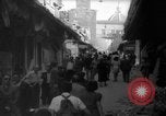 Image of Italian people crossing the war damaged Ponte Vecchio Bridge in Floren Florence Italy, 1945, second 16 stock footage video 65675053879