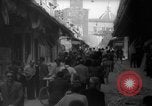 Image of Italian people crossing the war damaged Ponte Vecchio Bridge in Floren Florence Italy, 1945, second 22 stock footage video 65675053879