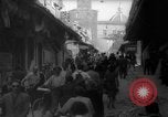 Image of Italian people crossing the war damaged Ponte Vecchio Bridge in Floren Florence Italy, 1945, second 23 stock footage video 65675053879