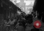Image of Italian people crossing the war damaged Ponte Vecchio Bridge in Floren Florence Italy, 1945, second 25 stock footage video 65675053879