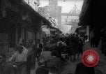 Image of Italian people crossing the war damaged Ponte Vecchio Bridge in Floren Florence Italy, 1945, second 27 stock footage video 65675053879
