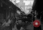 Image of Italian people crossing the war damaged Ponte Vecchio Bridge in Floren Florence Italy, 1945, second 28 stock footage video 65675053879