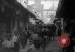 Image of Italian people crossing the war damaged Ponte Vecchio Bridge in Floren Florence Italy, 1945, second 29 stock footage video 65675053879
