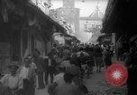 Image of Italian people crossing the war damaged Ponte Vecchio Bridge in Floren Florence Italy, 1945, second 30 stock footage video 65675053879
