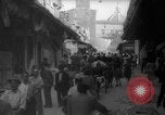 Image of Italian people crossing the war damaged Ponte Vecchio Bridge in Floren Florence Italy, 1945, second 31 stock footage video 65675053879