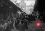 Image of Italian people crossing the war damaged Ponte Vecchio Bridge in Floren Florence Italy, 1945, second 32 stock footage video 65675053879