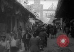 Image of Italian people crossing the war damaged Ponte Vecchio Bridge in Floren Florence Italy, 1945, second 33 stock footage video 65675053879