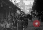 Image of Italian people crossing the war damaged Ponte Vecchio Bridge in Floren Florence Italy, 1945, second 34 stock footage video 65675053879