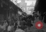 Image of Italian people crossing the war damaged Ponte Vecchio Bridge in Floren Florence Italy, 1945, second 35 stock footage video 65675053879