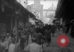 Image of Italian people crossing the war damaged Ponte Vecchio Bridge in Floren Florence Italy, 1945, second 36 stock footage video 65675053879