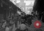 Image of Italian people crossing the war damaged Ponte Vecchio Bridge in Floren Florence Italy, 1945, second 37 stock footage video 65675053879